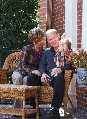 Grand Parents Having Good Time With Their One Year Old Grandson